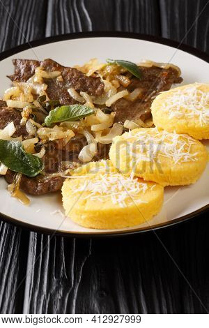 Fried Beef Liver With Onion And Sage, Served With Polenta Close-up In A Plate On The Table. Vertical