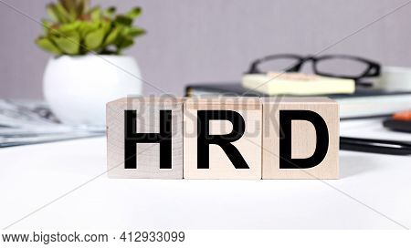 Hrd, Concept. Text On Wood Cubes. Text In Black Letters On Wood Blocks