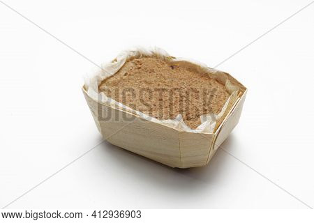 Homemade, Baked Pate In One Piece, In Baking Paper And Ecological Packaging, Isolated On A White Bac