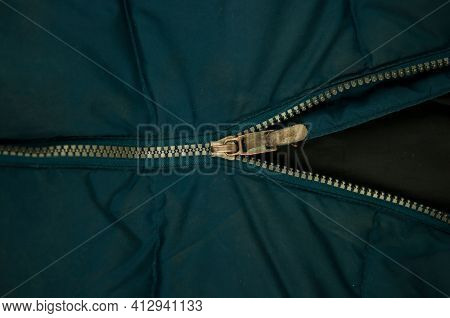 Detail of locking zipper on jacket. Close up macro local focus shot.