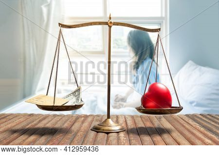 Chose Of Health And Money With Scale Concept With Patient On Hospital Bed On Background For Dicision