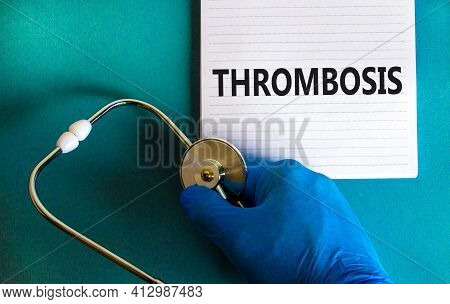Medical And Thrombosis Symbol. Doctor Hand, Stethoscope. White Note With The Word 'thrombosis'. Beau