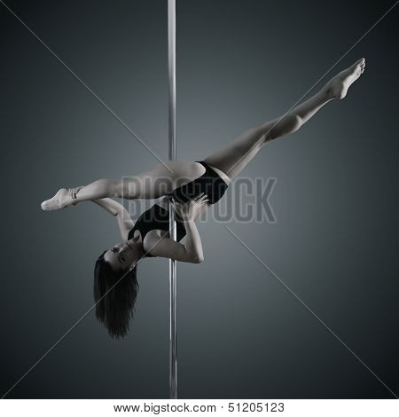 pole dancer, young woman dancing on pylon, toned and noise added