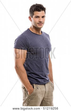 Handsome latin man smiling, isolated over a white background