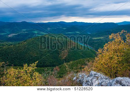 Beautiful Slovakian panoramic landscape with a rock and river down in the valley. Kosice area