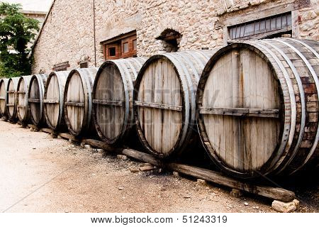 So many hogsheads of wine standing near the wall
