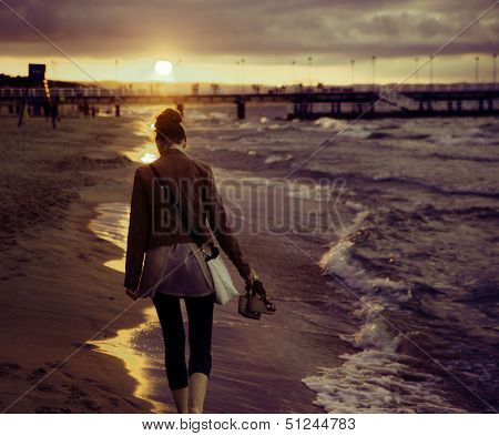 Sunset walk at the sea