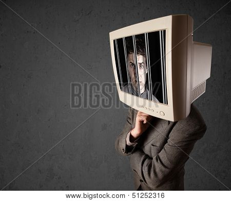 Business man with monitor screen on his head traped into a digital system concept