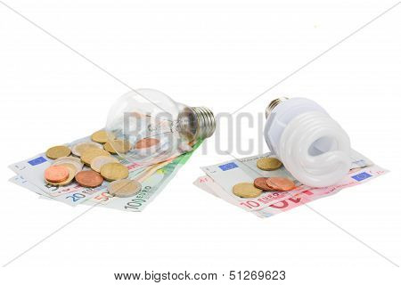 energy saving and normal   bulbs on euro money