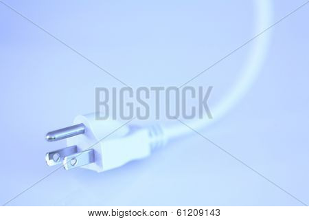 White three prong cord with bluish tone 