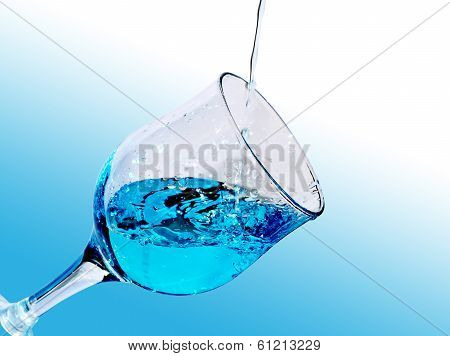 Water Is Poured Into The Glass