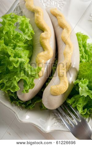 wurstel with green salad