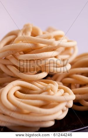 Murukku is a savoury snack from India