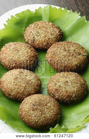 Narkel Posto Bora - A Bengali dish