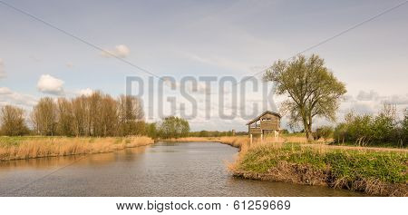 Wooden bird watching hut on concrete piles