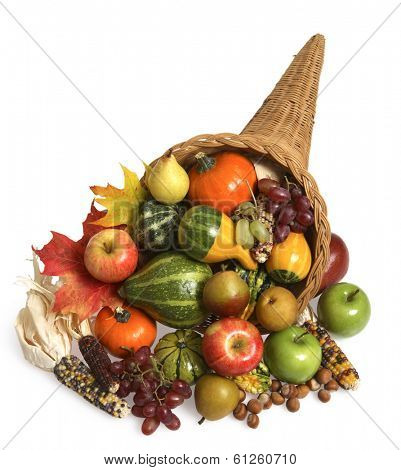 Cornucopia full of quash, pumpkins, and apples