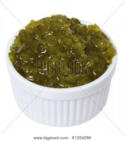 White dish of pickle relish on white background 