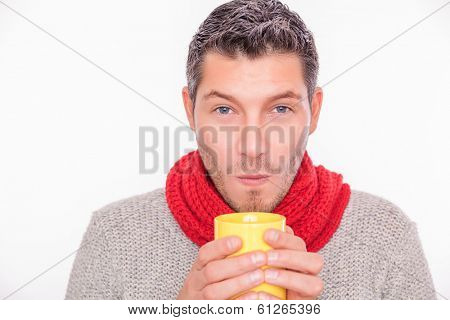 man blowing tea warming up colder season