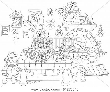 Bunny paints Easter eggs