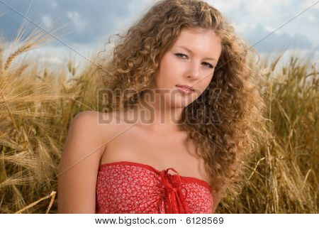 Twol slavonic girls on picnic in wheat field