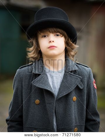 Boy In Long Coat And Top Hat