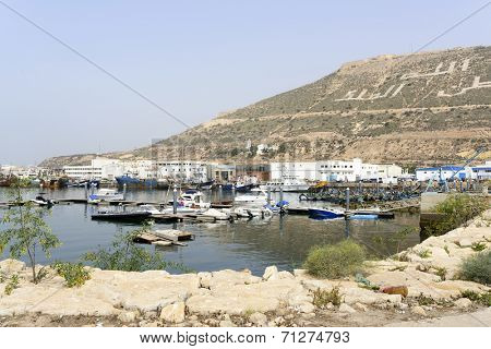 AGADIR, MAROCCO - AUGUST 27: View of fishing boats in Essaouira port on 27 August 2014 in Agadir, Marocco. Morocco is one of the largest producers of sardines in the world.