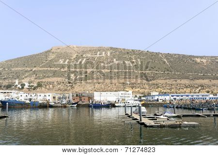 AGADIR, MAROCCO - AUGUST 27: View of fishing boats in Essaouira port on 27 August 2014 in Agadir, Marocco. Morocco is one of the largest producers of sardines in the world.