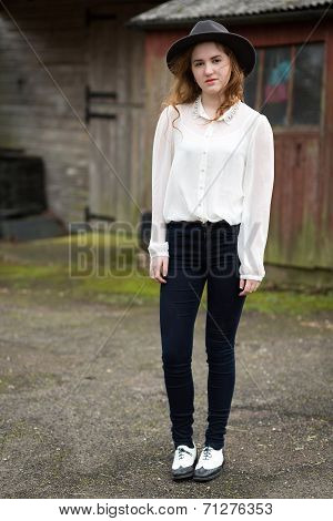 Beautiful Ginger Teenager In Front Of Stables