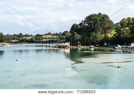 Boats In The Harbor Of Audierne At Low Tide  (france)