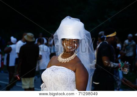 Jab Jab wedding guest in white
