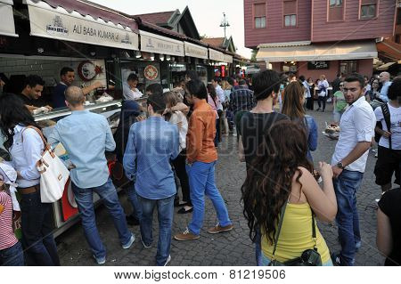 Tourists are buying fast food in Besiktas district near Besiktas ferry station, Istanbul