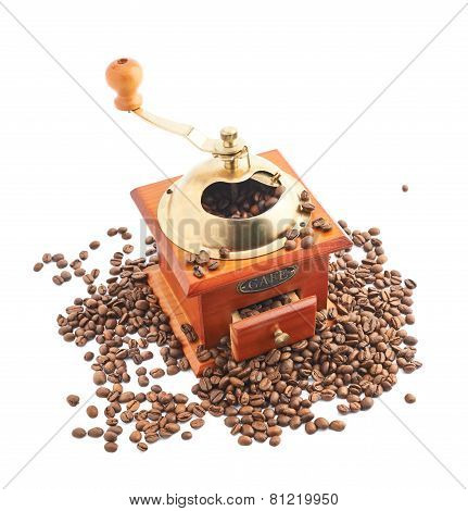 Traditional manual wooden coffee grinder isolated