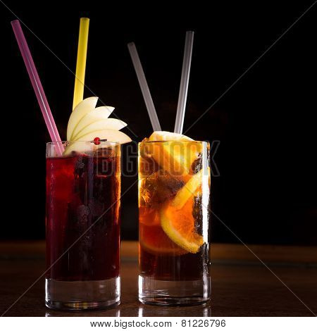 Cherry Bomb And Cuba Libre Cocktails In A Tall Glasses