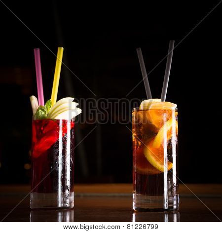 Cherry Bomb And Cuba Libre Cocktails In A Tall Glasses