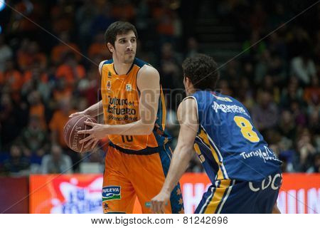 VALENCIA, SPAIN - JANUARY 24: Vives (L) and Neto during Spanish League match between Valencia Basket Club and UCAM Murcia at Fonteta Stadium on January 24, 2015 in Valencia, Spain