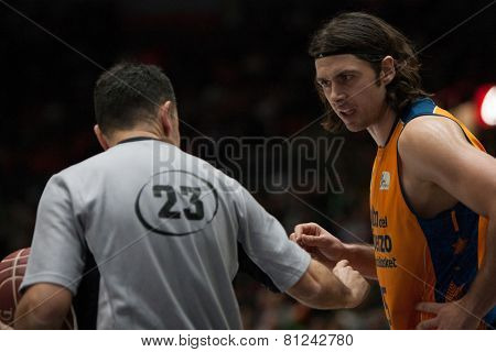 VALENCIA, SPAIN - JANUARY 24: Referee talks with Loncar during Spanish League match between Valencia Basket Club and UCAM Murcia at Fonteta Stadium on January 24, 2015 in Valencia, Spain