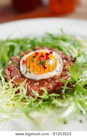 Beef tartare in plate, close-up