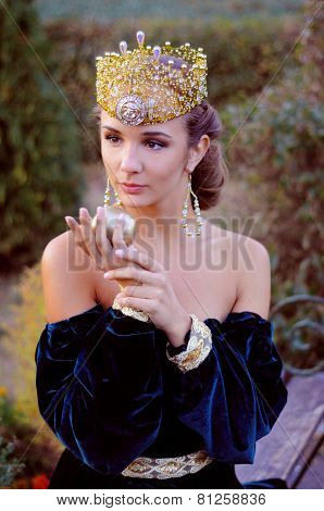Elegant Young Woman Dressed Like Queen