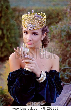 Elegant Young Woman Dressed Like Queen