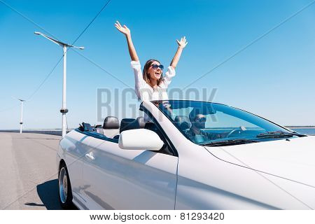 Couple In Cabriolet.
