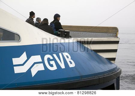 Ferry Amsterdam Ij In Misty Weather crossing to the onther site of the canal