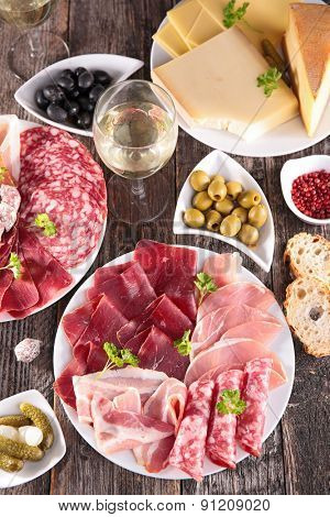 composition with meat, heese and wineglass