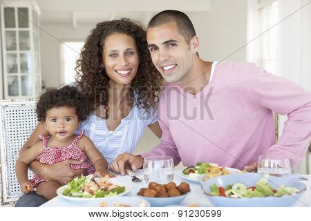 Family Enjoying Meal Together At Home