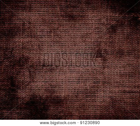 Grunge background of caput mortuum burlap texture