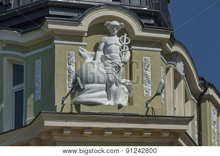Fragment of DSK building with human sculptures