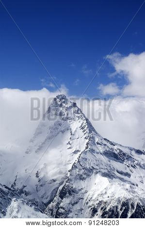 Snowy Mountains In Clouds