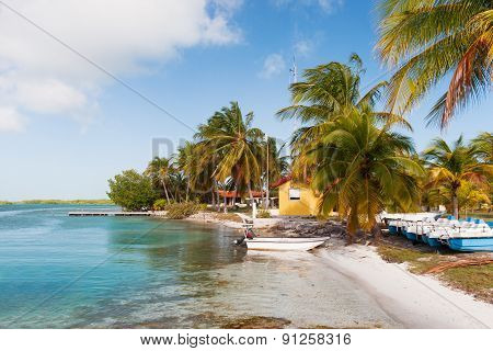 ?oast Of One Of The Islands Of Cuba - Sea, Boats, Palms And Bungalow.