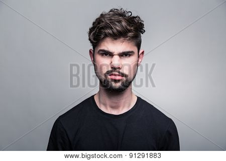 Professional studio portrait of young handsome man