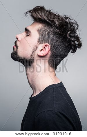 Professional studio portrait of young handsome man