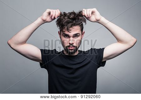 Professional studio portrait of young handsome man